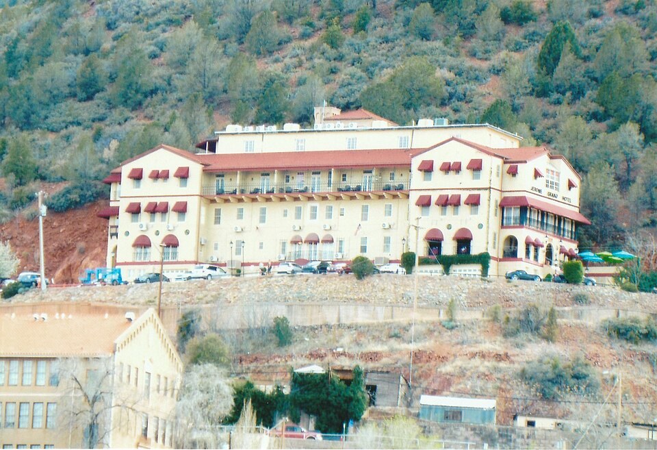 A broader view of the former United Verde Hospital building on the hillside above Jerome.